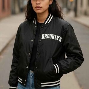 Women's Medium black "Cult Favorite" Brooklyn Varsity bomber jacket